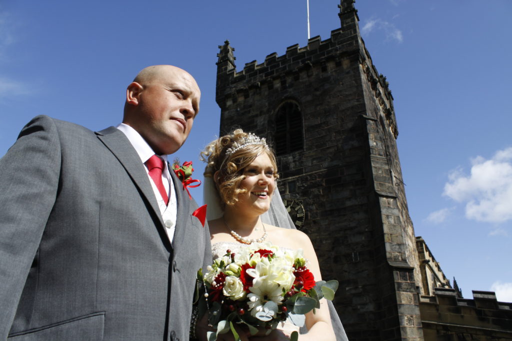 A couple on their wedding day at St Peter's